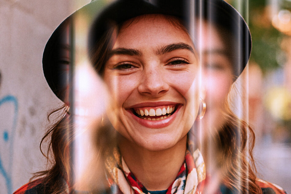 Laughing person with black hat, soft focus glass effect mockup