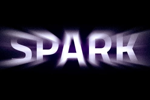Bold typography design of the word SPARK with glowing effects against a dark background ideal for digital assets and graphic design resources.