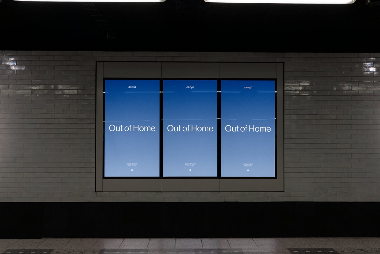Digital billboard mockup in a subway station with blue gradient background displaying Out of Home text suitable for advertising and graphic projects.