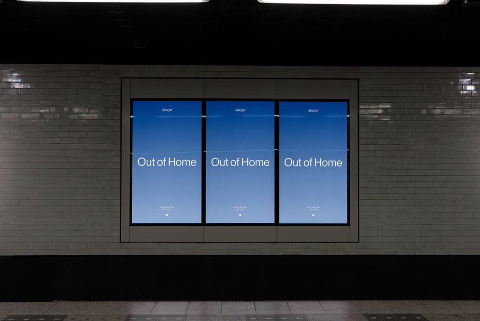 Three digital screens showing blue Out of Home campaign mockup in underground station