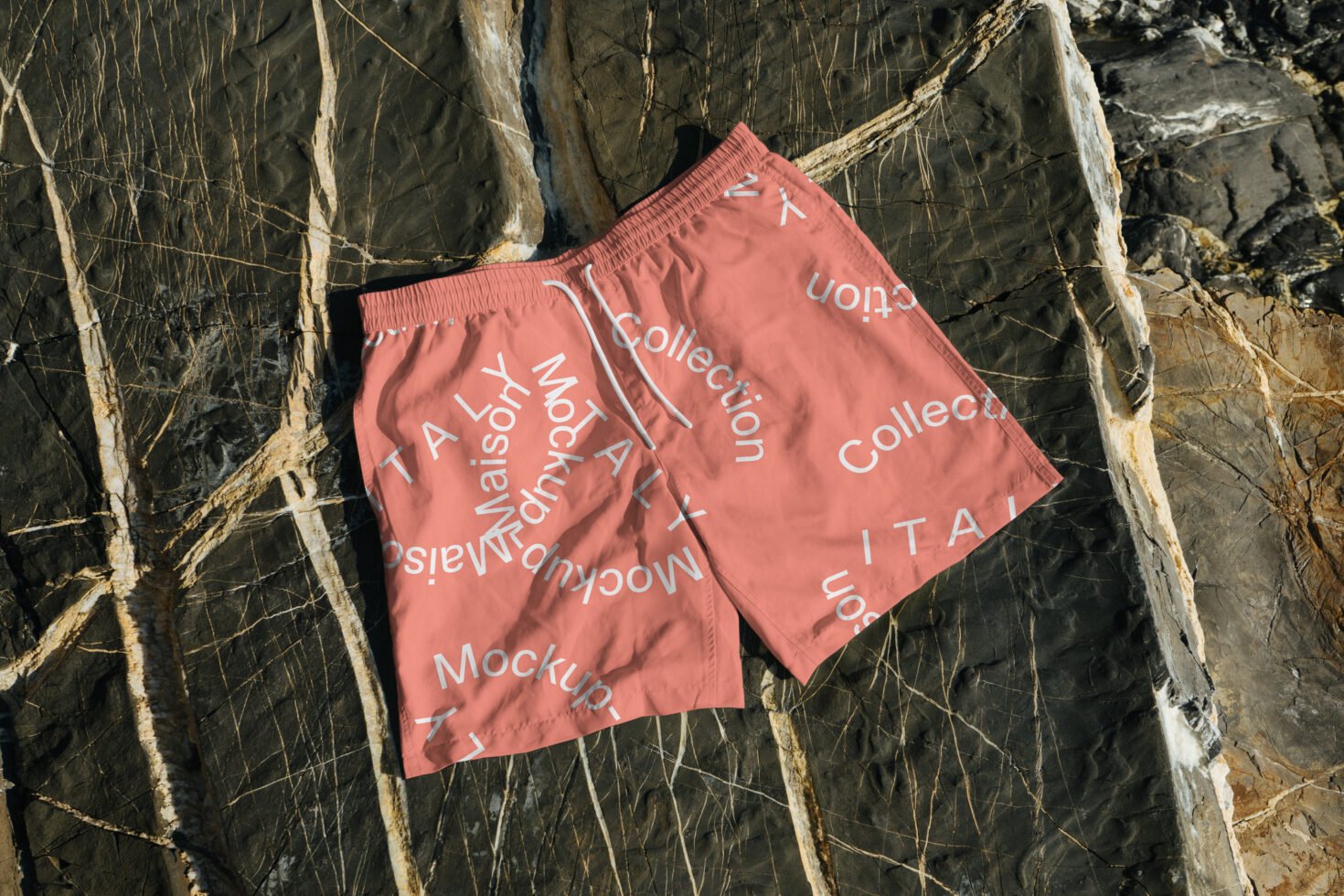 Shorts mockup on textured rock background ideal for fashion design presentations graphics for designers showcasing textile templates and outdoor themes.
