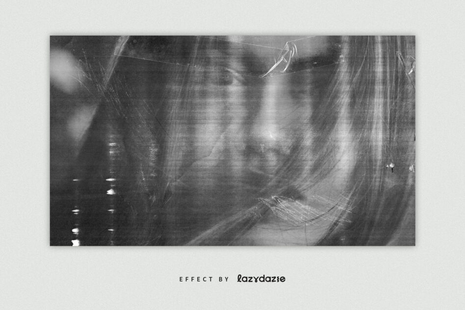 Grayscale image with heavy film grain, scratches, light streaks across moody atmospheric scene