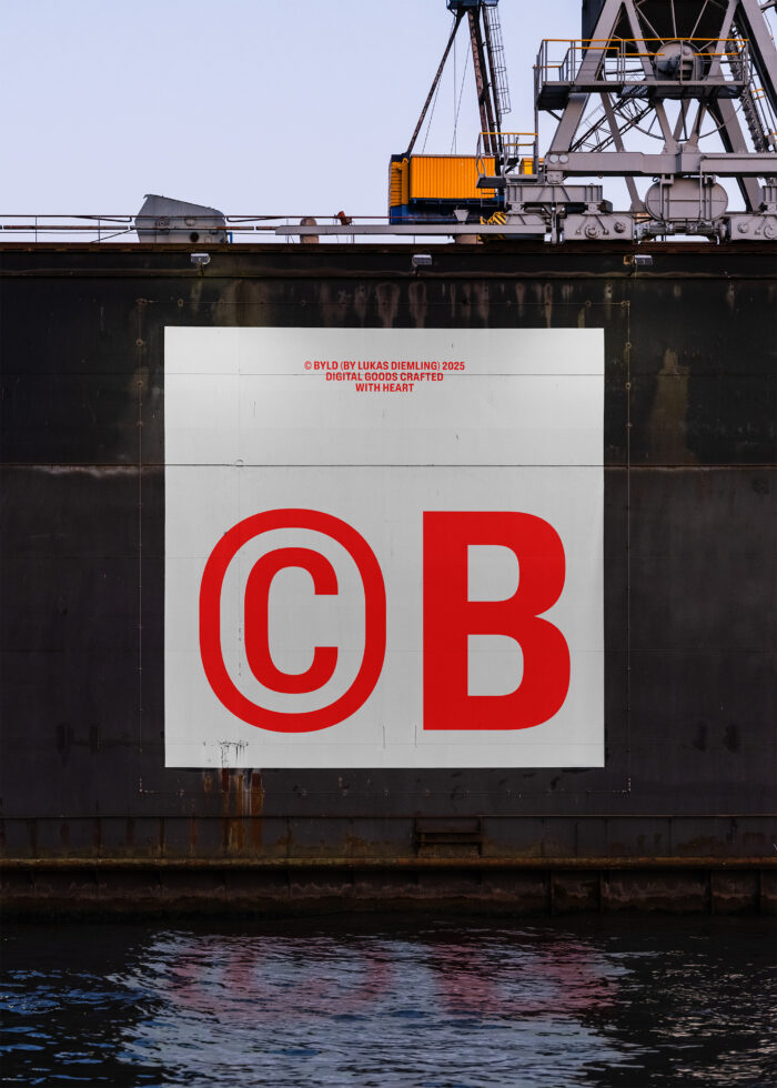 Large industrial wall display with bold red CB letters in modern font. Ideal for designers needing unique urban graphics. Industrial aesthetic backdrop.