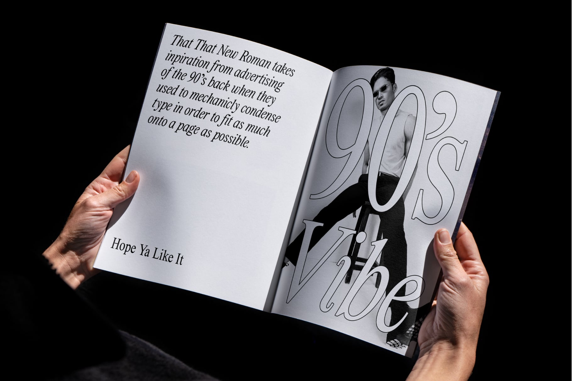 Open magazine spread showing 90s styled italic text over fashion photography