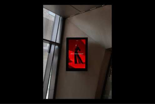 Stylish digital poster mockup in modern interior showcasing bold red fashion design perfect for template use by designers seeking sleek graphics.