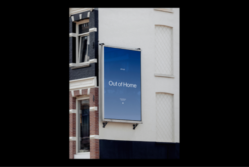 Urban billboard mockup on building facade showcasing Out of Home ad design. Ideal for designers in digital marketing and urban advertising.