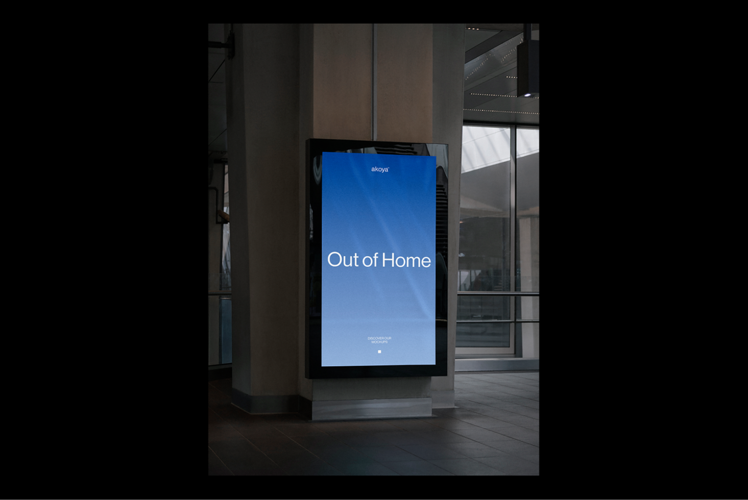 Digital billboard mockup in urban setting with blue screen displaying Out of Home text ideal for designers showcasing advertising designs and concepts.