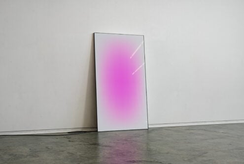 Minimalist artwork mockup featuring a glossy rectangular canvas with pink gradient leaning against a wall on concrete floor perfect for graphic designers