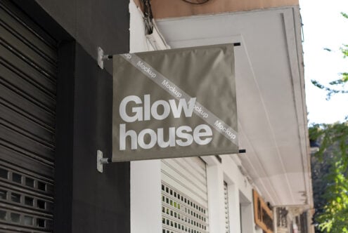 Hanging shop sign mockup with placeholder text Glow house showcases realistic urban setting for branding and signage design projects for designers.
