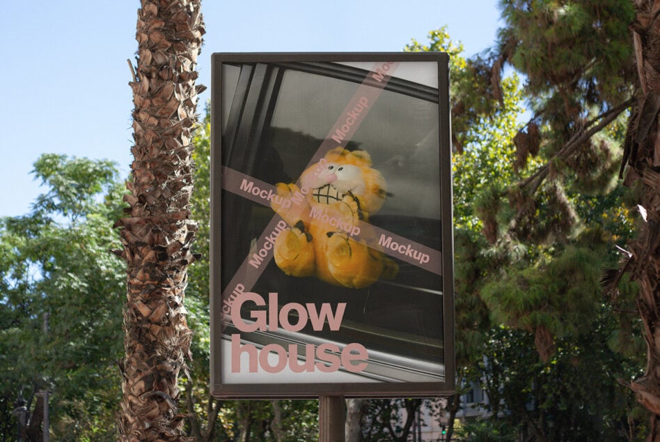 Outdoor billboard mockup displaying a colorful stuffed toy and text Glow house. Ideal for designers seeking creative advertising templates.
