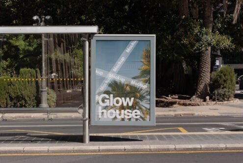 Bus stop poster mockup with bold text Glow house set against a backdrop of palm trees and urban street. Perfect for advertising graphic design templates.