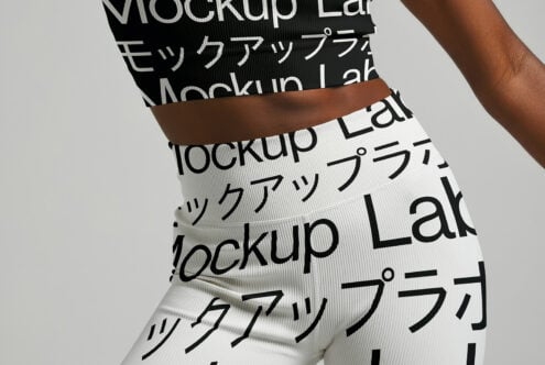 Athletic apparel mockup illustration featuring black and white text pattern in Japanese and English. Perfect for fashion designers and graphic templates.