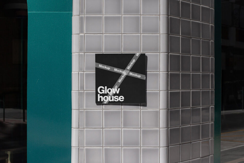 Black business card mockup angled on white metro tiles with diagonal tape strips