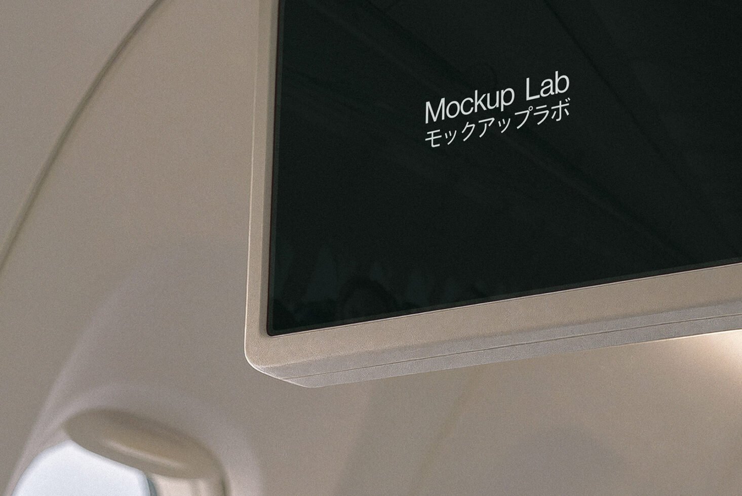 Airplane seat display showing Mockup Lab with Japanese text ideal for airline advertisement mockups digital assets for graphic designers templates.