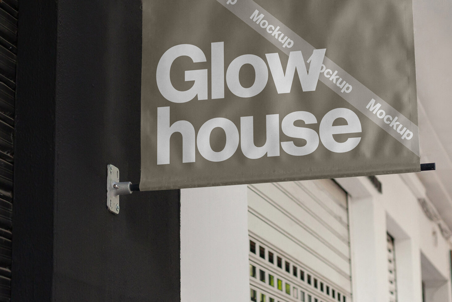 Storefront banner mockup with text glow house hung on a black wall. Ideal for showcasing branding designs. Perfect for designers needing realistic mockups.