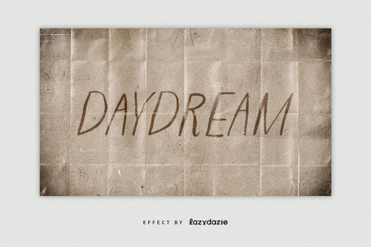 Grunge textured paper background with Daydream text effect in bold handwritten style. Ideal for graphic design projects, typography, font inspiration.