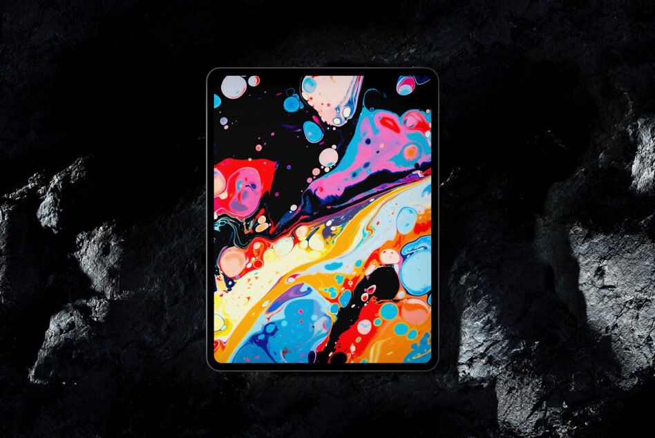 Tablet mockup displaying colorful liquid marble abstract design on textured surface