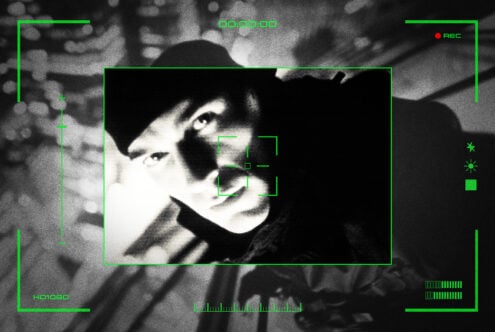Black and white image of a person in stealth mode through camera viewfinder overlay. Ideal for digital asset designers, graphics, mockup resources.