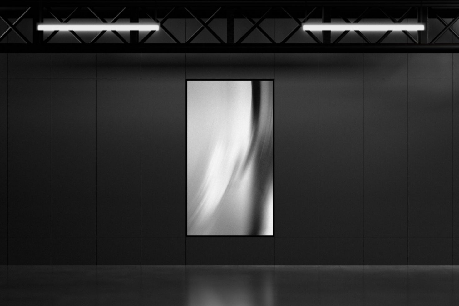 Large wall poster mockup in industrial setting with dark panels and overhead lights. Perfect for designers seeking modern display templates.