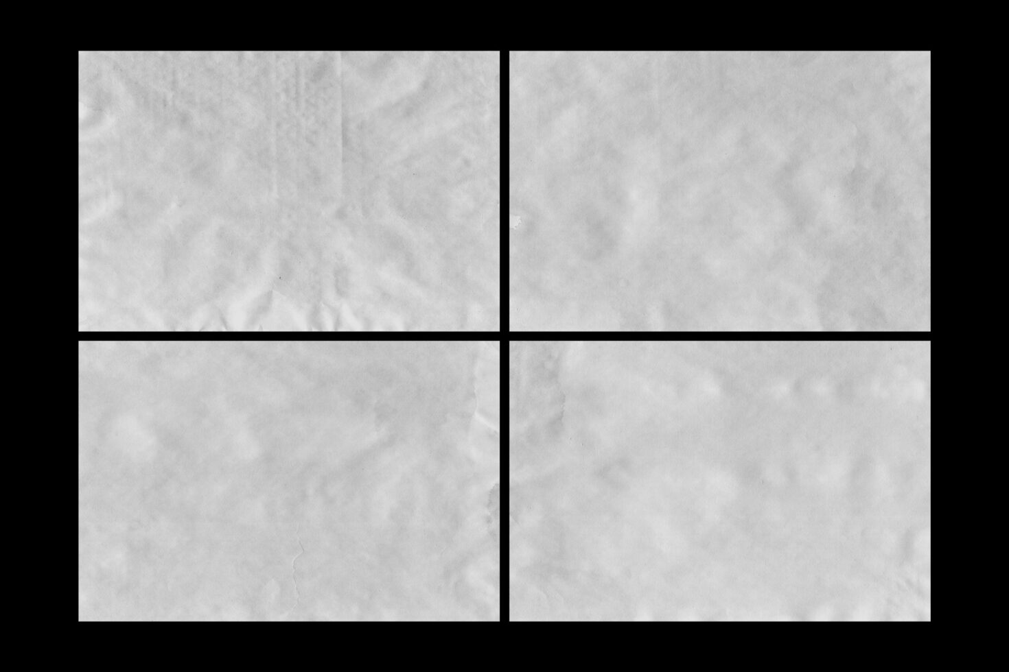 Gray paper texture background with subtle wrinkles shown in four quadrants for use in graphic design mockups templates ideal for designers.