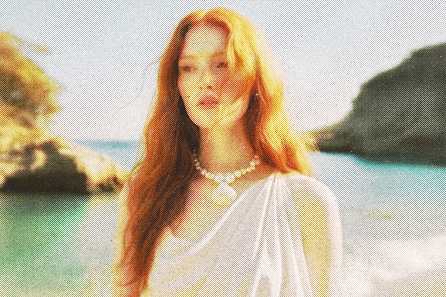 Elegant woman with red hair in a coastal backdrop wearing a pearl necklace Halftone effect Fashion mockup Digital graphics design asset for designers