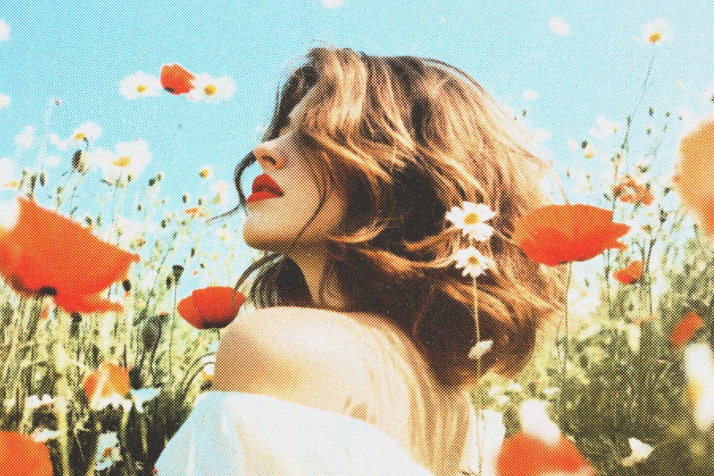 Woman in a field of red poppies and daisies with retro pop art effect perfect for graphic design projects floral templates and creative photography.