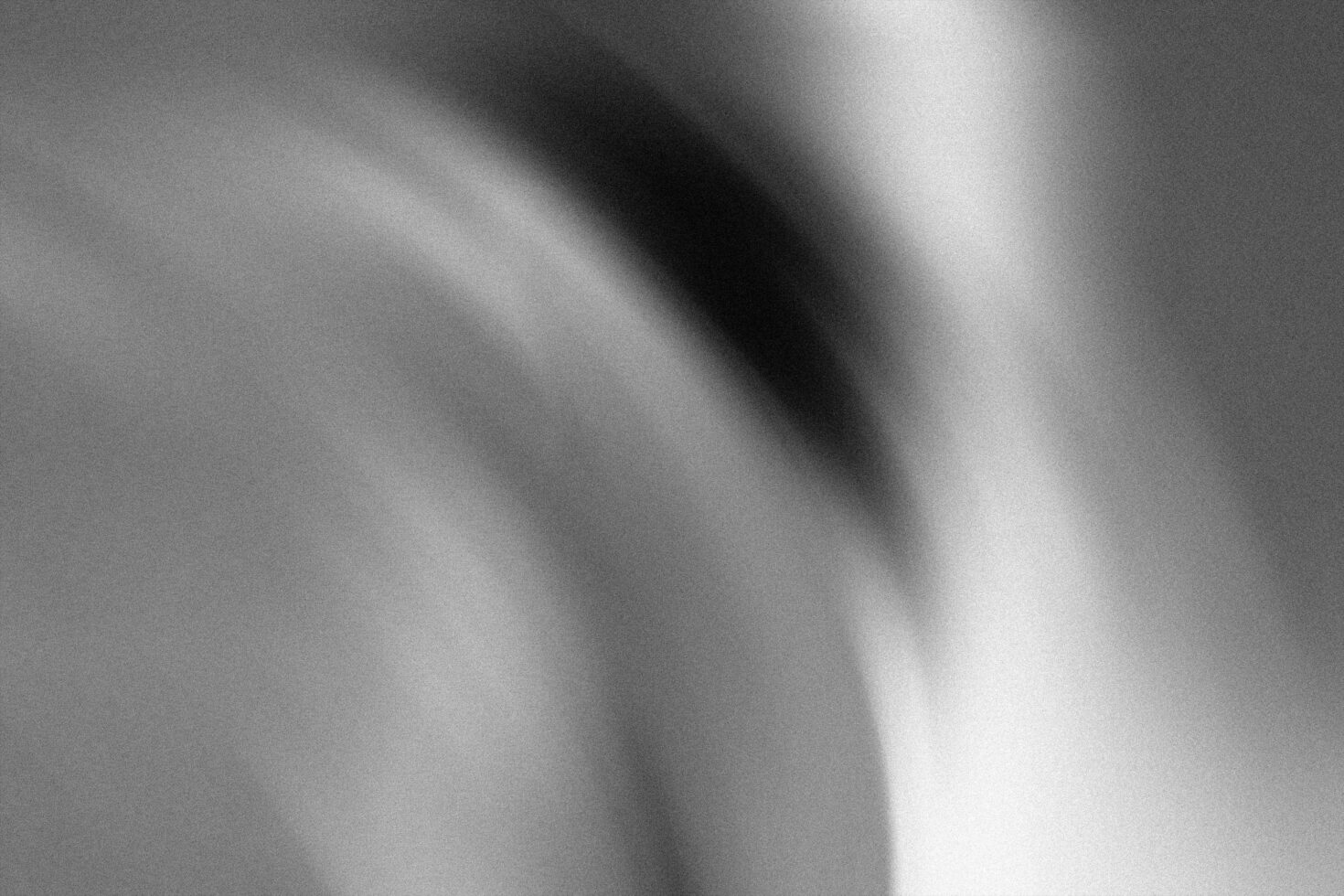 Abstract grayscale blurred texture useful for mockups backgrounds or graphic design projects ideal for designers seeking a minimalist artistic touch.
