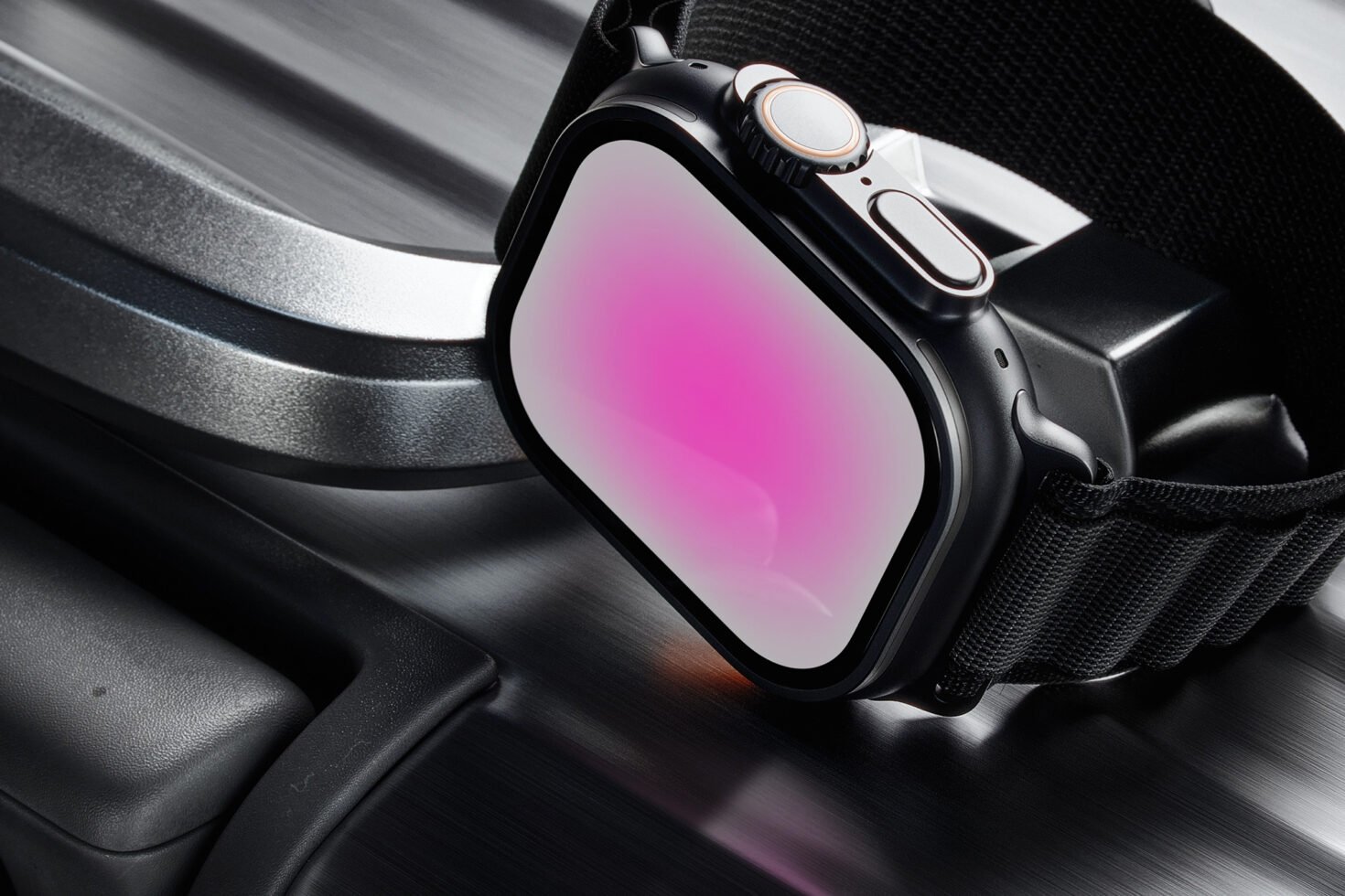 Smartwatch mockup with a sleek black band and a blank pink gradient screen. Ideal for showcasing digital designs. Keywords: smartwatch mockup digital.
