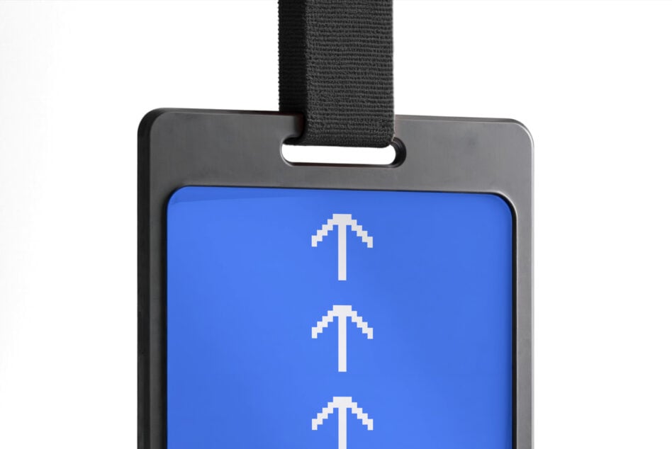 ID badge mockup with blue gradient display showing pixel arrows hanging from black fabric lanyard