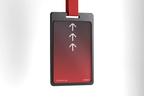 ID card mockup with black frame and red lanyard, featuring white arrow design on a red gradient background, ideal for brand identity and design projects.