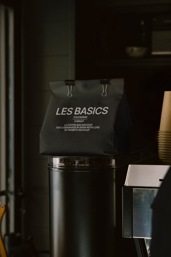 Coffee bag mockup on metal container in ambient setting ideal for packaging design presentation high-resolution branding mockup for designers.