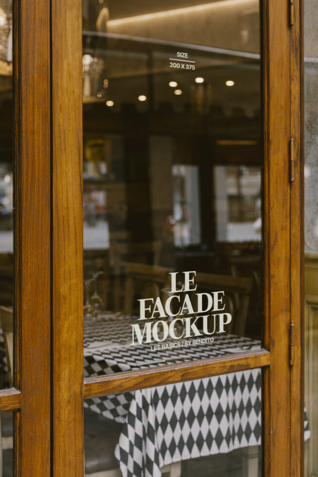 Facade mockup with wooden door showcasing cafe interior ideal for storefront design template shop graphics and designer assets.