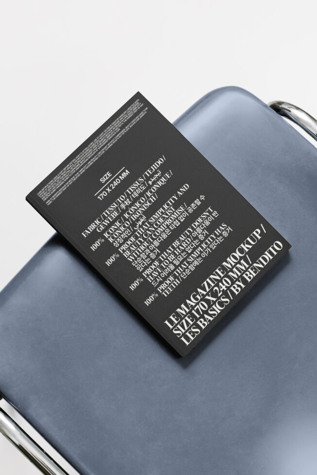 Black woven label mockup on blue fabric with multilingual product details