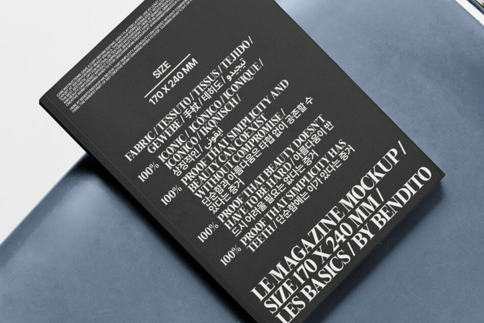 Black woven tag on blue surface showing care instructions in multiple languages