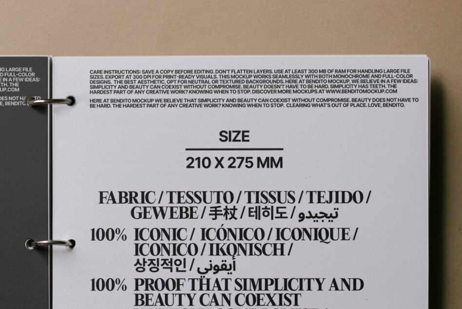 Opened care instruction tag with multilingual fabric content labels on kraft paper