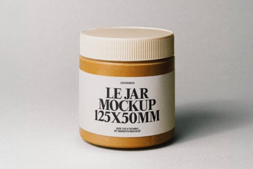 Jar mockup with beige lid and customizable label for product design. Ideal for designers needing a realistic 125x50mm container mockup graphic asset.