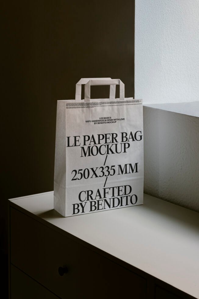 Paper bag mockup on a shelf showcasing a design template for packaging. Ideal for graphic designers and branding projects. High-resolution display.