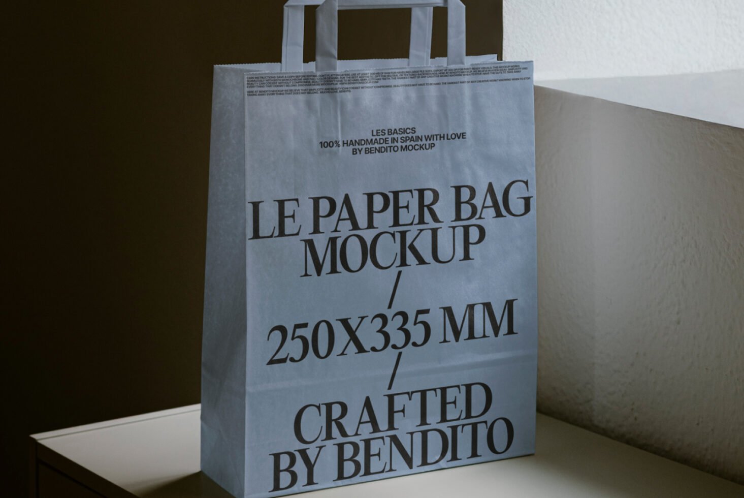 Paper bag mockup with text Crafted by Bendito 250x335 mm. Ideal for showcasing designs and templates in realistic settings for design projects.