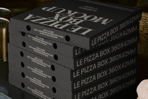 Stacked black pizza box mockup with white text, ideal for designers seeking packaging templates. Featuring dimensions 360x42mm. Perfect for graphic mockups.