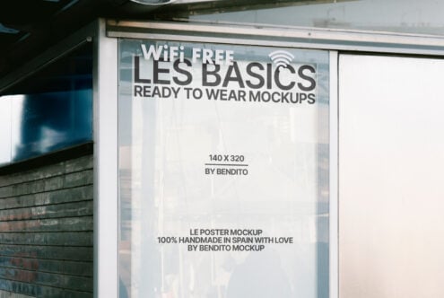 Glass storefront showcasing WiFi Free Les Basics poster mockup by Bendito. Ideal for retail design, graphic templates, and advertising displays.
