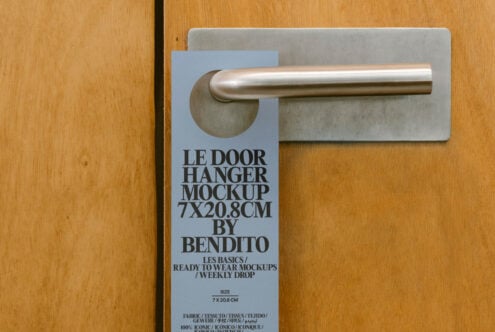 Door hanger mockup on wooden door handle, showcasing sleek design and typography for creative projects. Ideal for designers seeking high-quality templates.
