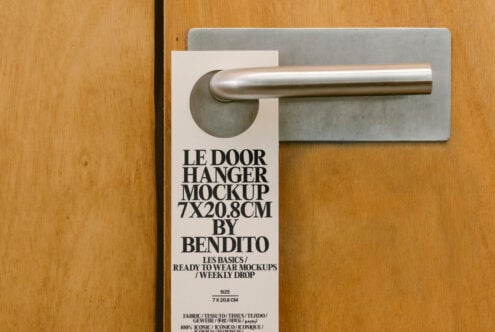 Door hanger mockup 7x20.8cm on wooden door handle for designers. Ideal for showcasing branding or hospitality designs. Mockup asset for creatives.