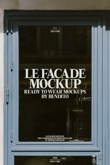 Blue storefront window with white serif text on black glass displaying Le Facade Mockup