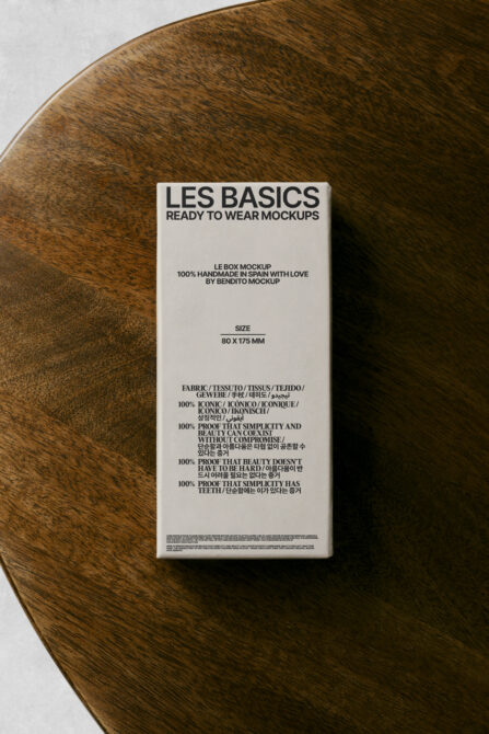 Cream box mockup on wooden surface, front cover with Les Basics Ready to Wear text
