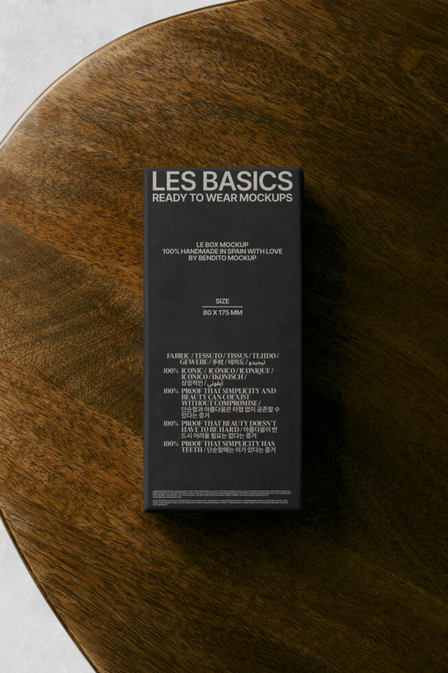 Black mockup packaging on wooden surface, featuring Les Basics brand. Ready to wear design, minimalistic style. Ideal for designers seeking high-quality mockups.