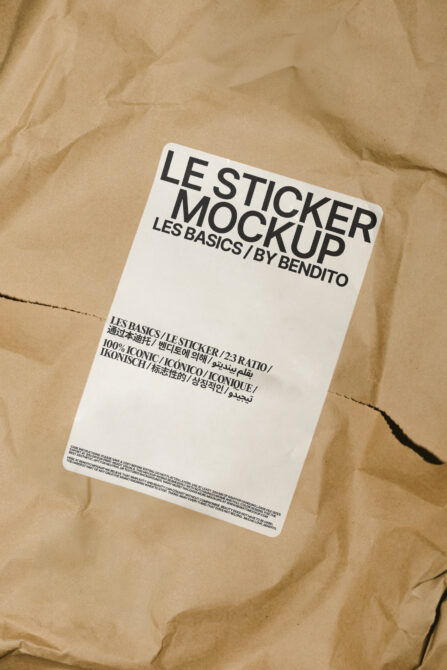 White sticker mockup on textured kraft paper background showing layout
