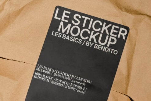 Sticker mockup on crumpled brown paper background ideal for showcasing branding. Keywords: mockup, design, template, graphic, sticker, branding.
