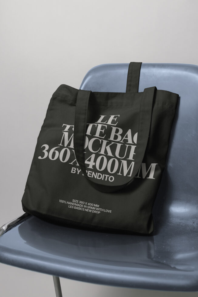 Tote bag mockup on a chair featuring bold typography design. Perfect for showcasing branding or graphic designs. Ideal for designers seeking editable templates.