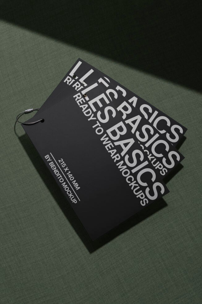 Elegant black tag mockup on textured green background for designers. Minimalistic design ideal for branding, graphic design, and template projects.