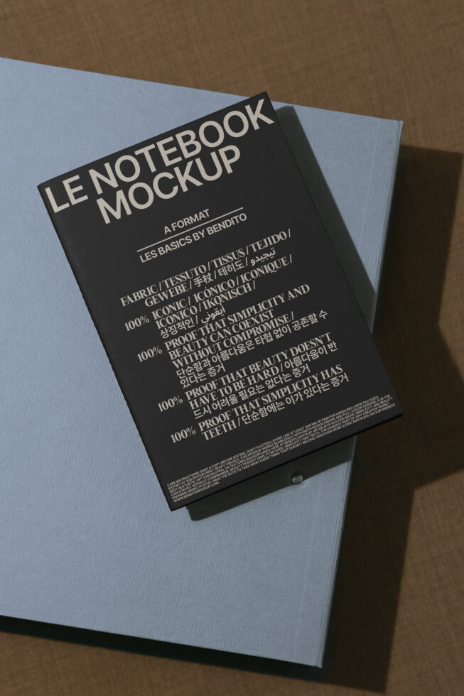 Notebook mockup on textured surface for designers. High-quality template for showcasing cover designs. Ideal for digital assets, graphic design projects.